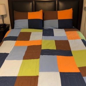 Cute queen size quilt with matching pillow covers